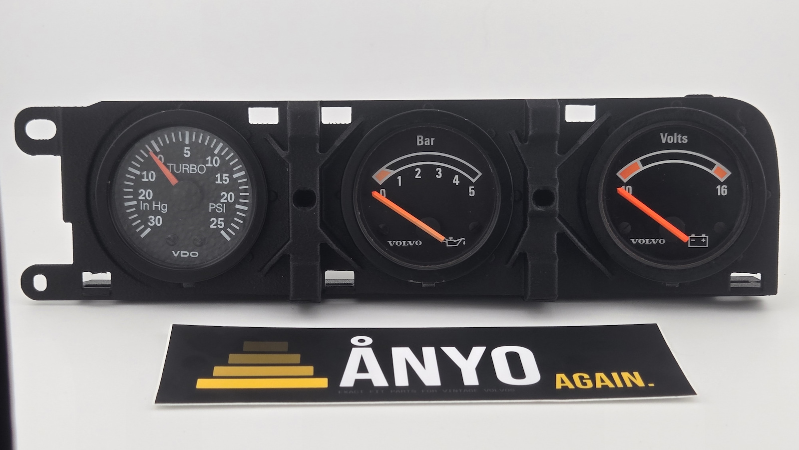 Volvo 240 triple gauge bracket with three 52mm VDO gauges installed — front view