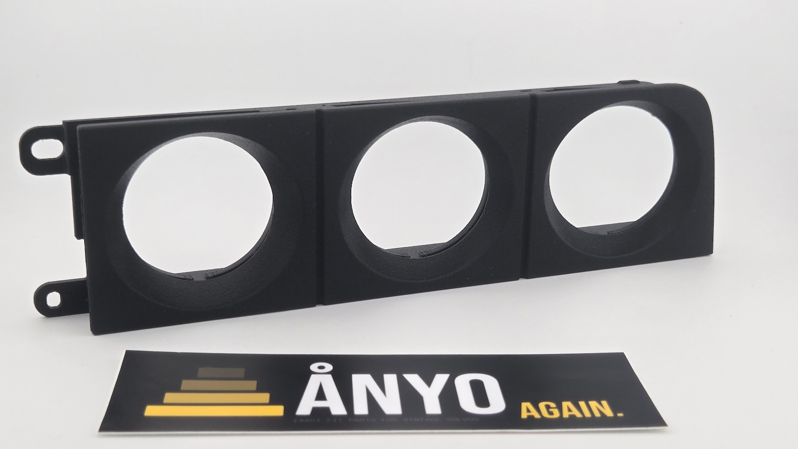 Volvo 240 triple gauge bracket and bezel combo assembled — angled front view